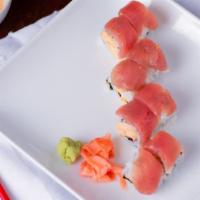 Tiger Roll · Crabstick tempura inside with eel, avocado and caviar on top.