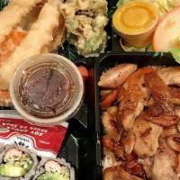 Chicken Teriyaki Combination Deluxe · Served with salad, California roll, tempura, and rice.