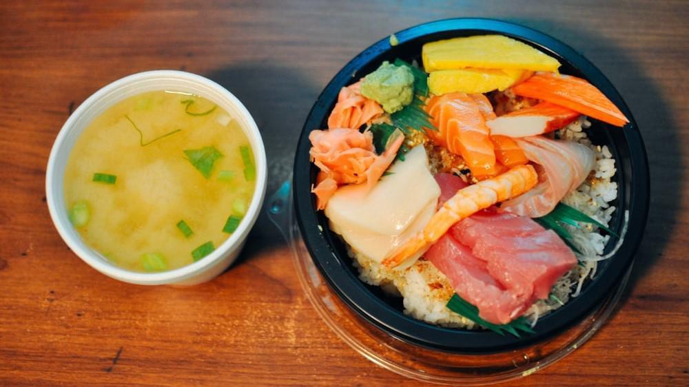 Chirashi Lunch · Assorted raw fish (11pc)on a bed of sushi rice. Served with a side.