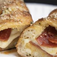 Small Pepperoni Stromboli · Loaded with pepperoni. Filled with mozzarella cheese.