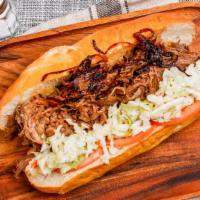 Pulled Brisket Sandwich · A Baguette Stuffed with pulled brisket that was slow cooked in our hickory bbq sauce.
