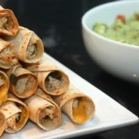 Flautas De Pollo (5) · Deep fried tortilla stuffed with chicken and onions, served with sour cream, lettuce and pic...