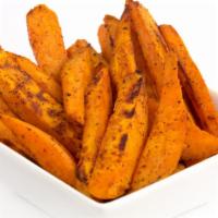 Sweet Potato Fries · Hand-cut sweet potato crispy fries.