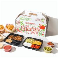 Family Fiesta Pack Deluxe · Make your own taco pack for 5. Includes rice, beans, protein, toppings plus queso, guacamole...