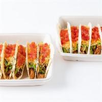 Taco Pack · Six or twelve tacos with your choice of protein all made with shredded lettuce, diced tomato...