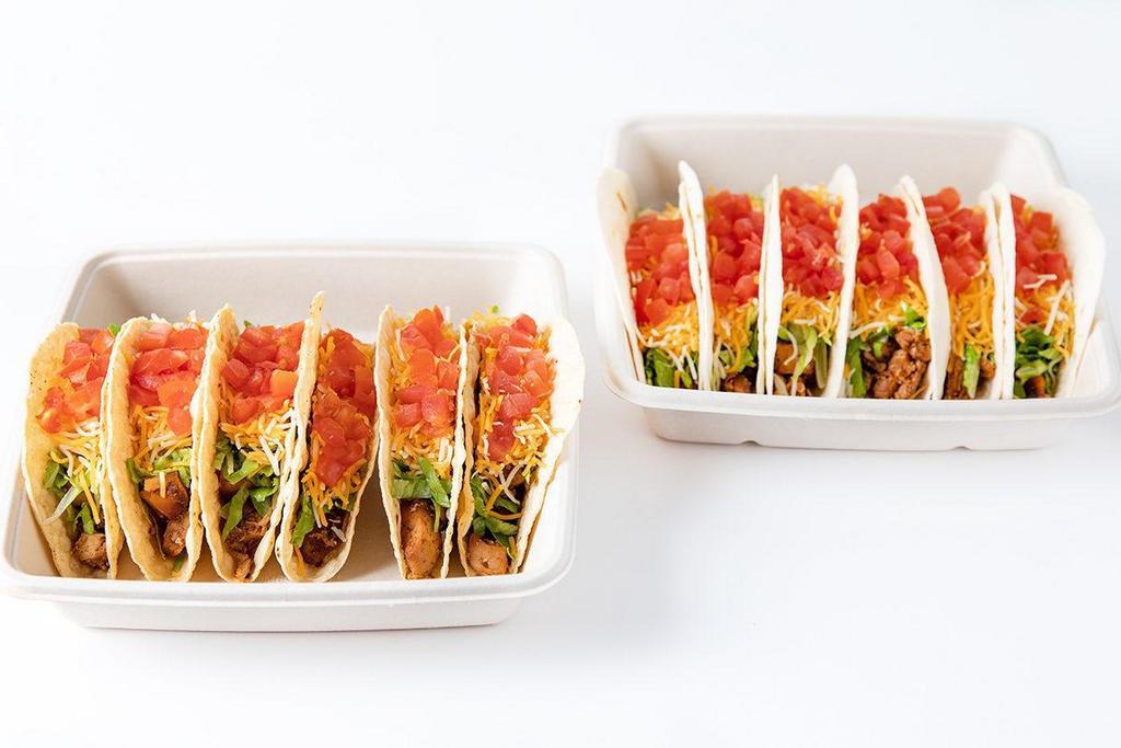 Taco Pack · Six or twelve tacos with your choice of protein all made with shredded lettuce, diced tomatoes and shredded cheese.