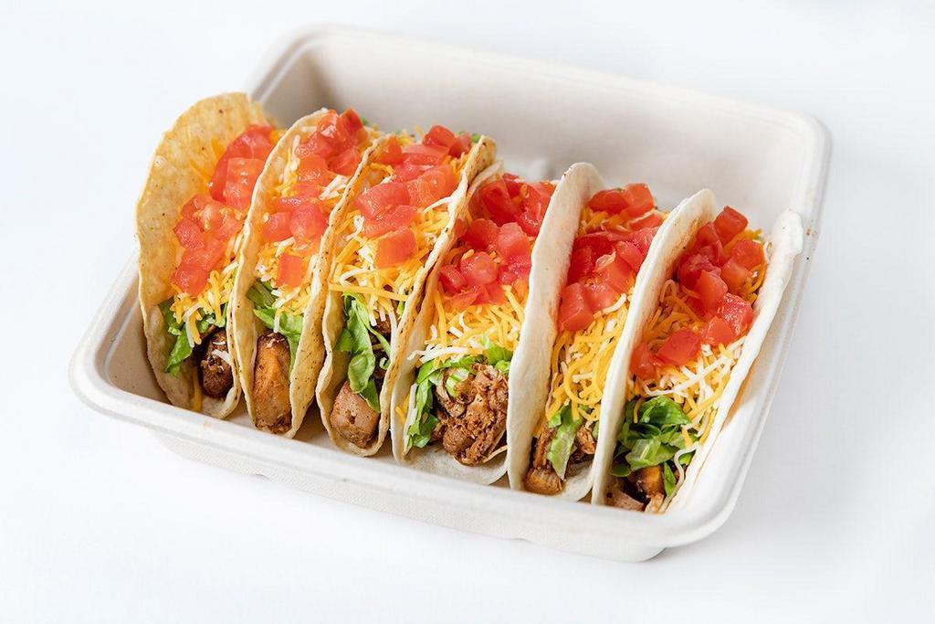 Taco Pack · Six or Twelve tacos with your choice of protein all made with shredded lettuce, diced tomatoes and shredded cheese.