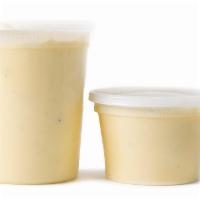 Queso · One pint feeds 4-6 people. One quart feeds 8-10 people. Chips sold separately.