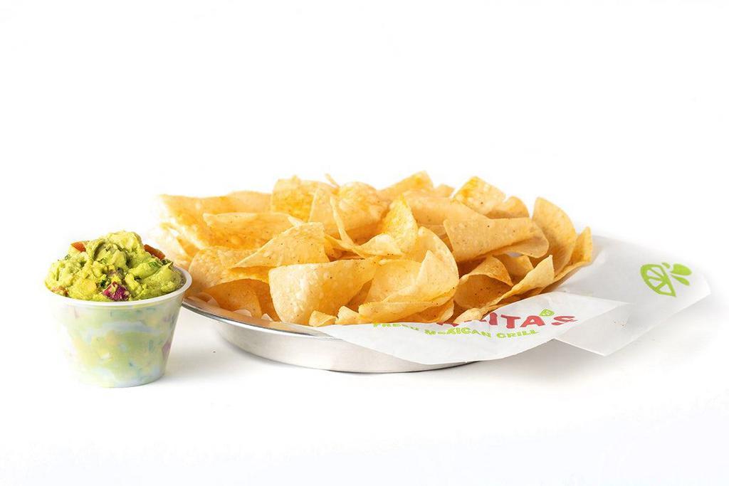 Chips & Guacamole · Individual portion of our wildly addictive chips & hand-mashed guacamole..