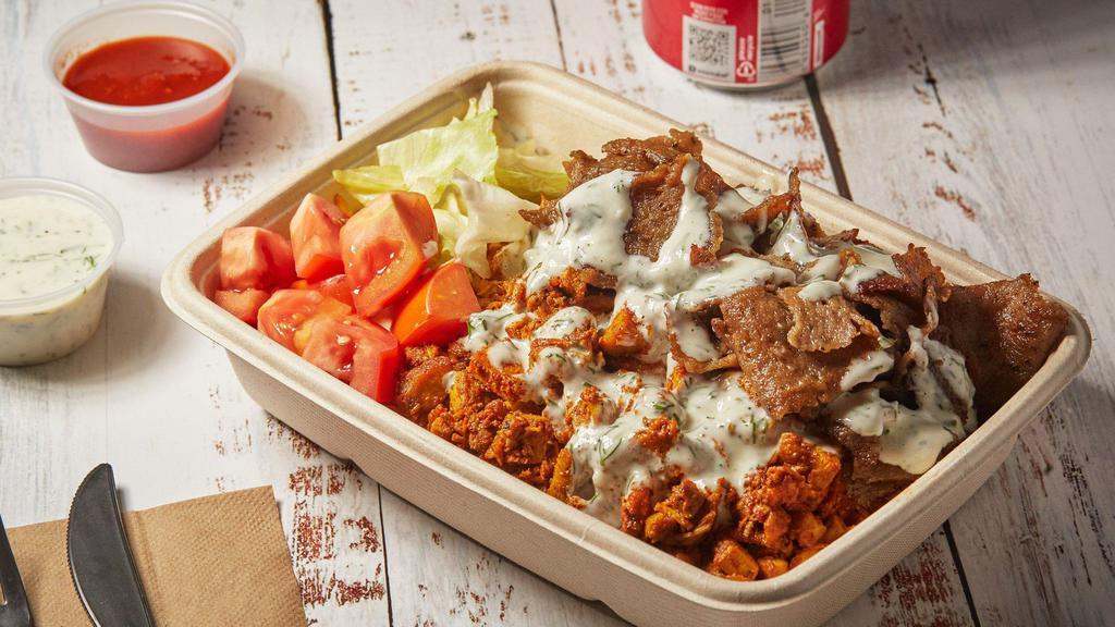 Combo (Chicken And Beef Gyro) Platter · Combo of chicken and beef gyro platter, served with your choice of sauce.