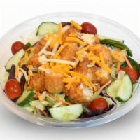 Pdq Salad · Chicken, mixed greens, red cabbage, carrots, cheddar & jack cheeses, tomatoes, cucumbers, ho...