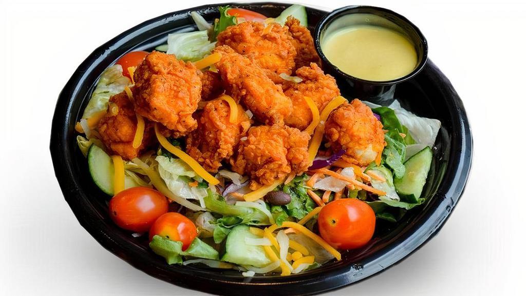 Spicy Pdq Salad · Spicy Chicken, mixed greens, red cabbage, carrots, cheddar & jack cheeses, tomatoes, cucumbers, honey mustard dressing.