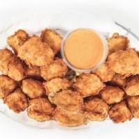 24  Crispy Nuggets · Crispy nuggets with choice of signature sauce
