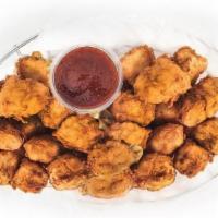 24 Spicy Nuggets · Spicy crispy chicken nuggets with choice of signature sauce.