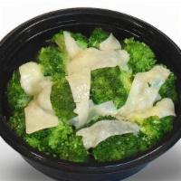 Catering Parmesan Broccoli · Serves 8-10. Butter, garlic & shaved parmesan cheese.