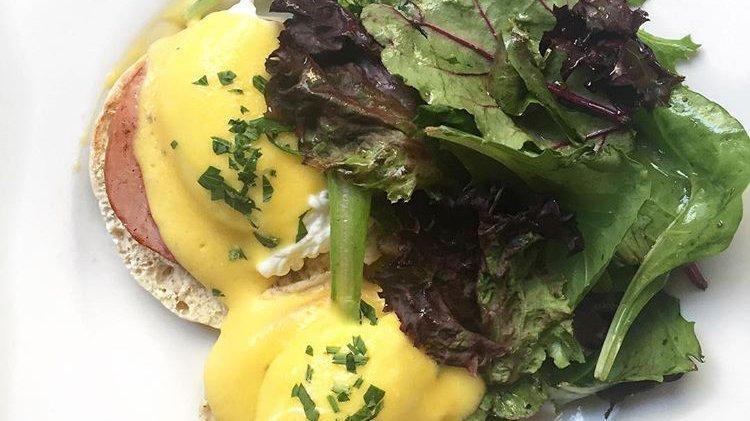 Eggs Benedict · Bacon on an English muffin topped with Hollandaise sauce. Served with field greens.
