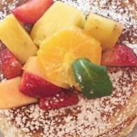 Pancakes · Served with fresh fruit and maple syrup.