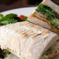 Grilled Chicken Panini · All-natural chicken with avocado, arugula, Asiago cheese and roasted tomatoes vinaigrette on...
