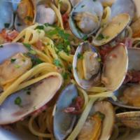 Linguini Fini With Baby Clams And Bacon · Served with baby clams.