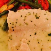 Poached Salmon · Served with string beans, cherry tomato and lemon sauce.