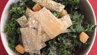 Organic Kale Caesar Salad · With croutons.parmigiano cheese and caesar dressing