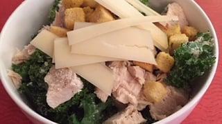 Organic Kale Chicken Caesar Salad · A new twist on an old classic. All-natural chicken on a bed of organic kale. Comes with crou...
