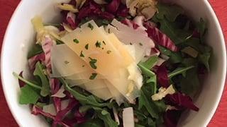 Tricolore Salad · All organic Belgium endives, radicchio, arugula and Parmigiano Reggiano cheese with lemon vi...