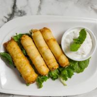 Feta Cigars · Pan-fried filo rolls with feta cheese and parsley