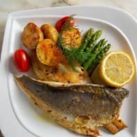 Sea Bass · Served with roasted potatoes and asparagus.