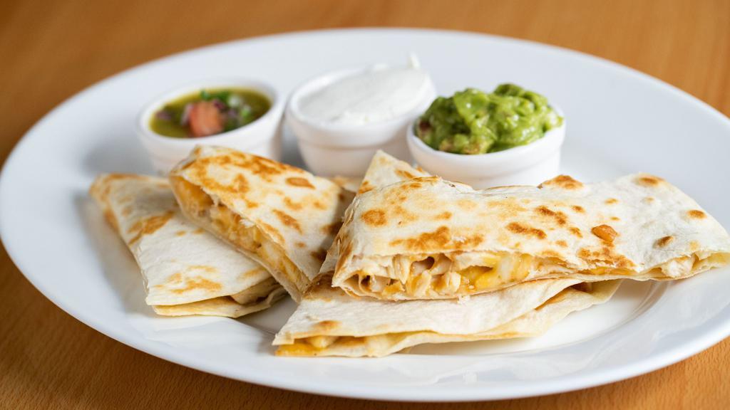 Quesadillas · 2 Quesadillas with mixed greens, salsa & sc. For cheese, grilled chicken or roasted vegetable with an additional charge.