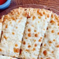 Cheesy Bread · Crust, garlic sauce, asiago, mozzarella, marinara on the side.