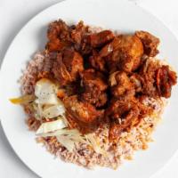 Brown Stewed Chicken Meal · Served with rice and peas, white rice or mac and cheese.
