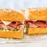 Danny'S Favorite · Thinly sliced salami, capicola, and spicy ham with provolone cheese, shredded lettuce, and o...