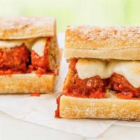 Meatball Parm (Served Hot) · Tender, Italian-style meatballs topped with our savory seasoned tomato sauce and melted mozz...
