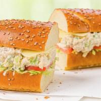 Chicken Salad Sub · Our signature chicken salad with fresh shredded lettuce, tomatoes, and provolone cheese on a...