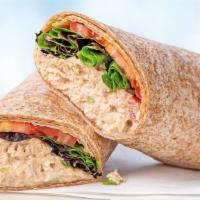 Tuna Salad Wrap · Our signature tuna salad with organic green leaf lettuce and tomatoes in a wheat wrap.