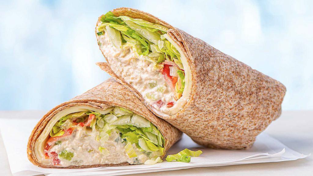 Chicken Salad Wrap · Our signature chicken salad, fresh shredded lettuce, tomatoes, and provolone cheese in a wheat wrap.