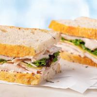 All Organic Turkey Sandwich · Tender organic turkey and creamy organic Muenster cheese with organic mayo-mustard mix and f...