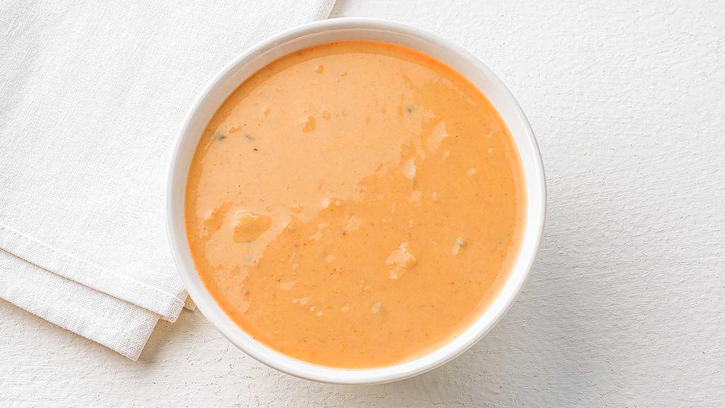 Lobster Bisque Soup · Minced sweet lobster meat simmered in cream and sherry create a rich and creamy lobster bisque.