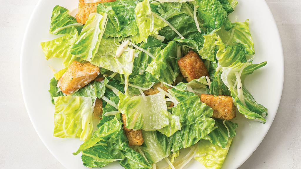 Regular Caesar Salad · Fresh romaine, croutons, grated Imported Parmigiano Reggiano (aged 24 months), and Amore Caesar Dressing.
