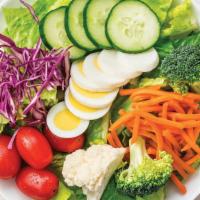 Large Garden Salad · Fresh romaine with Broccoli, matchstick carrots, cucumber, grape tomatoes, hardboiled eggs, ...