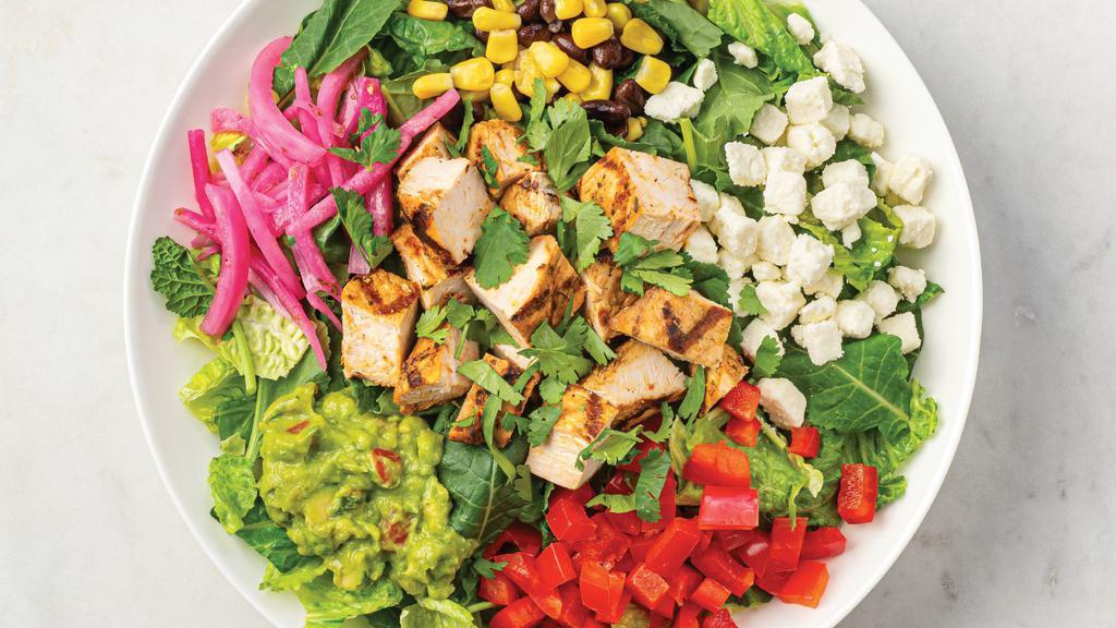 Large El Jefe With Peruvian Chicken & Guacamole · Organic baby kale and romaine with grilled Peruvian chicken, roasted corn, organic black beans, red bell peppers, pickled red onion, crumbled feta cheese, guacamole, cilantro, and Lime Vinaigrette Dressing.