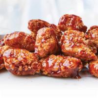 Boneless Chicken Bites · Tender, juicy breaded all white meat chicken, available plain or with your choice of sauce.