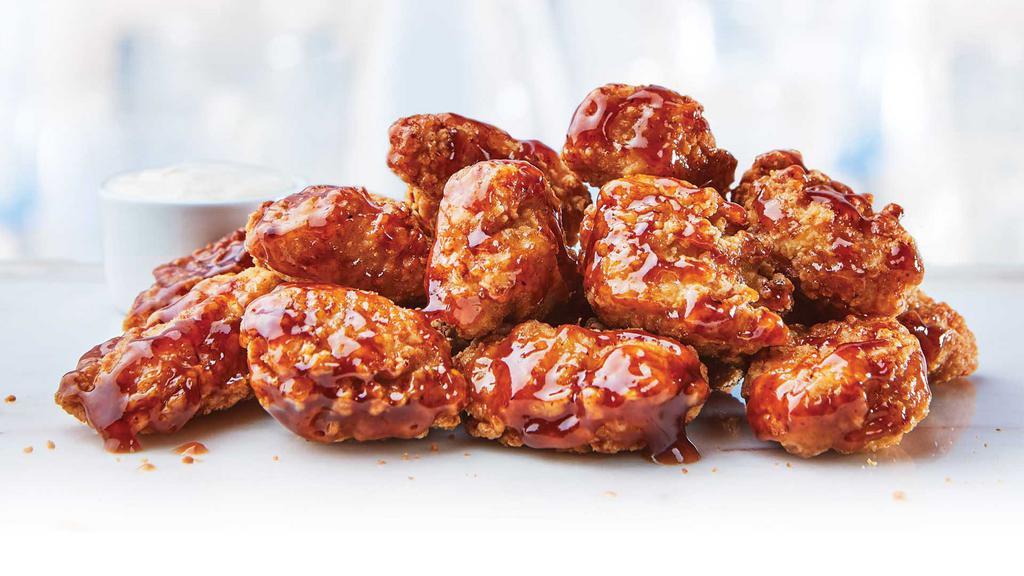 Boneless Chicken Bites · Tender, juicy breaded all white meat chicken, available plain or with your choice of sauce.