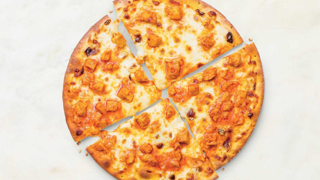 Buffalo Chicken Pizza · Diced chicken tossed in our signature Buffalo wing sauce with creamy blue cheese dressing and shredded mozzarella. Hot & ready to enjoy!