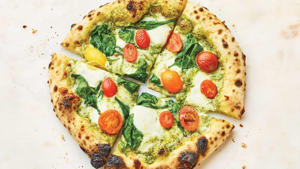 Pesto, Tomato & Spinach Pizza · Baby spinach, tomatoes, mozzarella, and creamy basil pesto on our signature crust made with Italian flour. Hot & ready to enjoy!