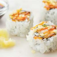 Shrimp Tempura Roll · Crunchy-sweet Black Tiger shrimp tempura, cool lettuce and spicy sauce, topped with teriyaki...
