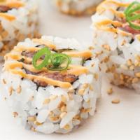 Spicy Tuna Roll · Ahi tuna and spicy sauce rolled with cucumber and finished with toasted sesame seeds and sca...