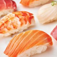 9-Pc Nigiri · Delicate sushi rice topped with King Salmon (3-pc), Ahi Tuna (2-pc), Yellowtail (2-pc), and ...