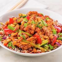 Kung Pao Chicken Bowl · Tender chicken stir-fried with red peppers, scallions, and peanuts, tossed with our Szechuan...